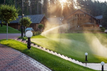 vacation area with lawn sprinklers