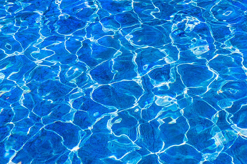 closeup of blue reflective pool water