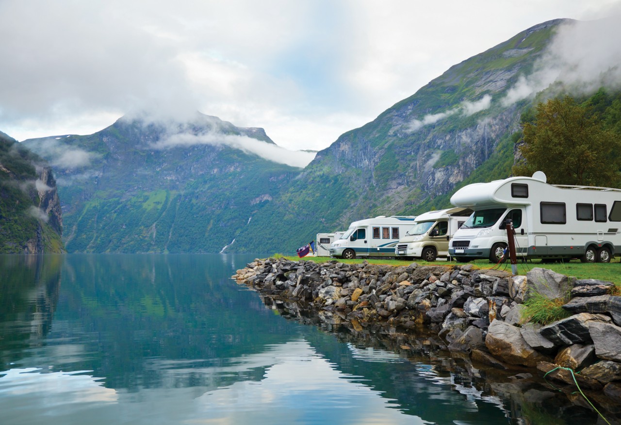 Motorhomes at campsite by the Geirangerfjord in Norway; Adobe Stock: 35642128